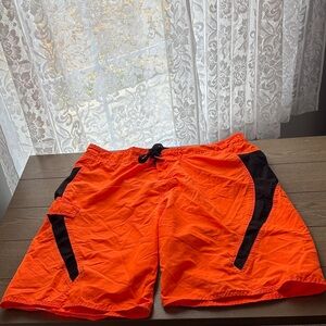 Vibrant Orange Swim Trunks with Black Accents